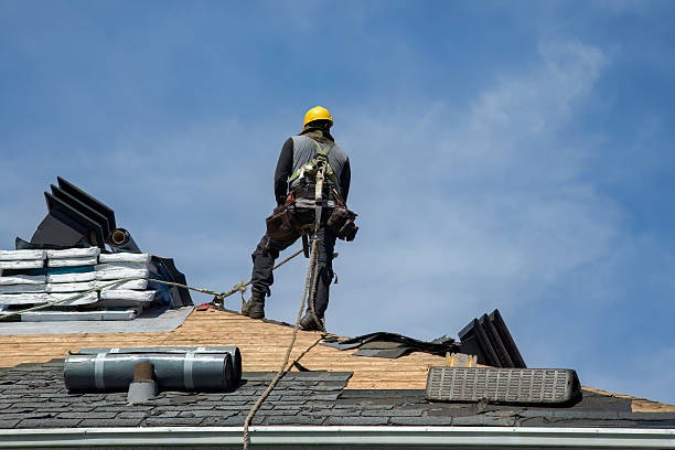 Professional Roof Replacement technician working in Mission, OR